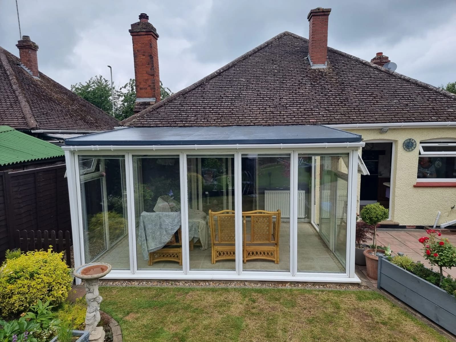 Home with flat conservatory roof