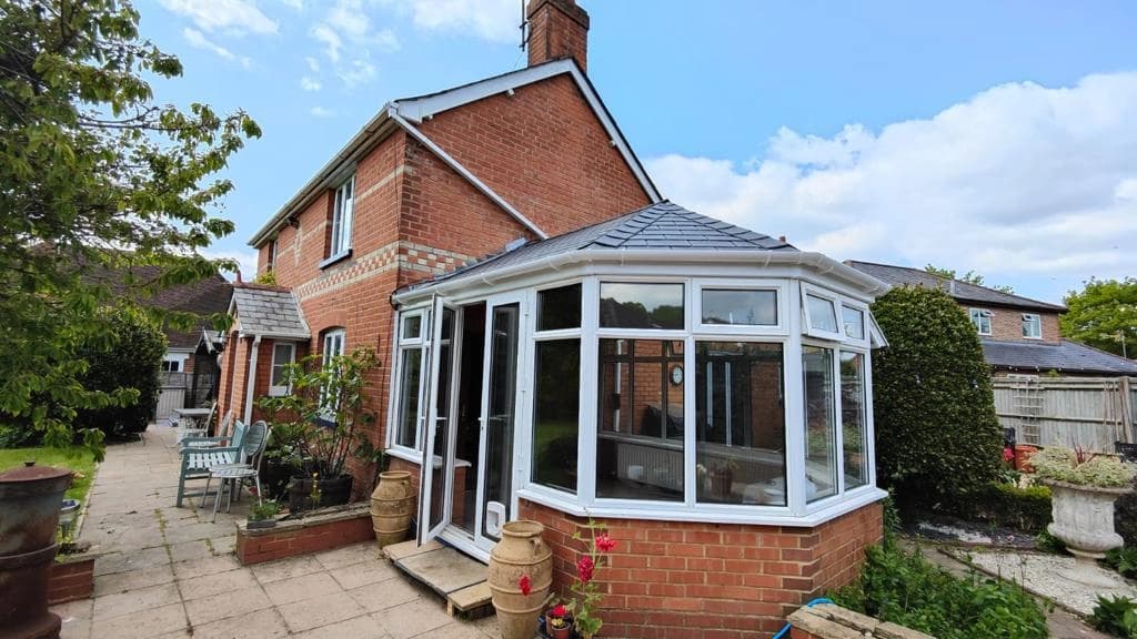 Nice look conservatory roof with tiled roof